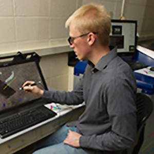 Graduate student Tyler Curtis captures images from the spectral CT Graduate student Tyler Curtis captures images from the spectral CT