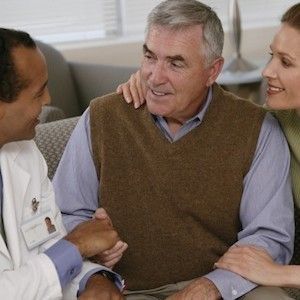 Stock photo, doctor talking to a man and woman, credit American Thoracic Society Stock photo, doctor talking to a man and woman, credit American Thoracic Society