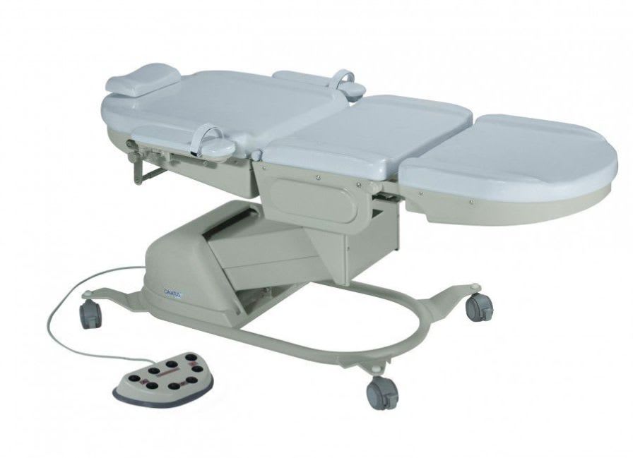 Dermatological examination table / electrical / height-adjustable / on casters RT 5000 Gnatus