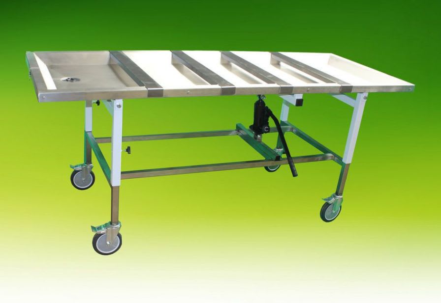Height-adjustable embalming table / on casters / hydraulic A.R. Twigg & Son