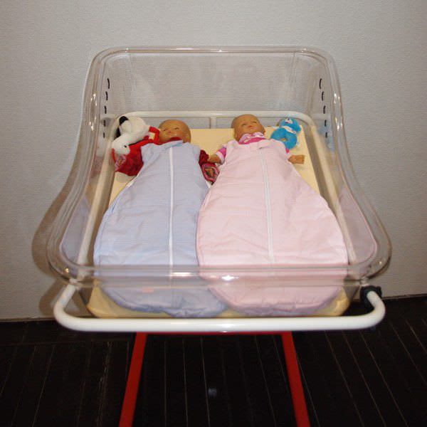 Height-adjustable hospital baby bassinet / transparent / for twins BABYNEL-Bed DUO lift Tech-NEL GmbH