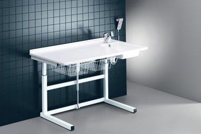 Changing table / electric / with sink / height-adjustable R8752 Pressalit Care