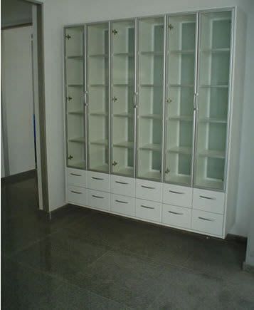 Storing cabinet / for healthcare facilities / with door / with shelf MULTY-DENT S.A.