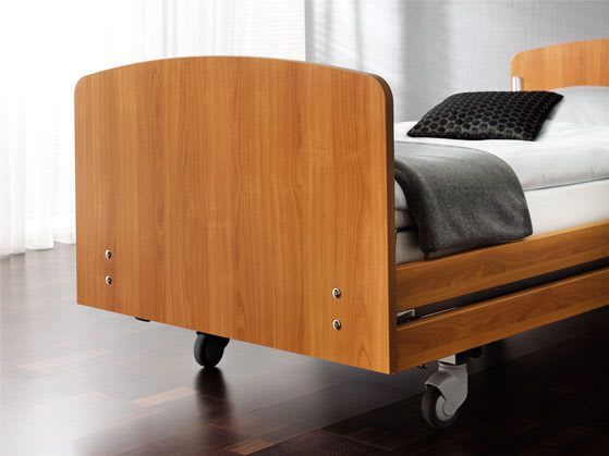 Nursing home bed / electrical / height-adjustable / on casters Movita LINET