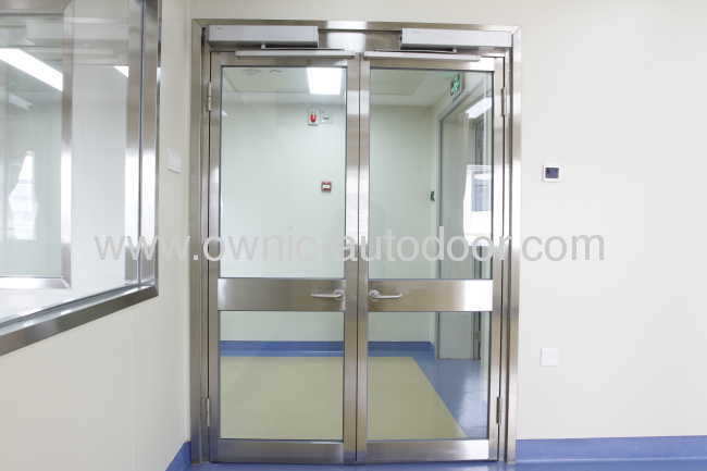 Hospital door / sliding / stainless steel / glass OZP01 OWNIC