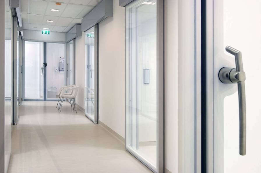 Hospital door / sliding / hermetic / with glass panel MF5 Dortek