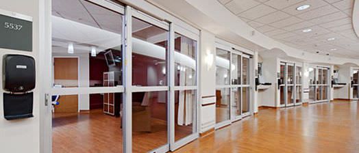 Laboratory door / hospital / telescopic / with glass panel VersaMax® BESAM
